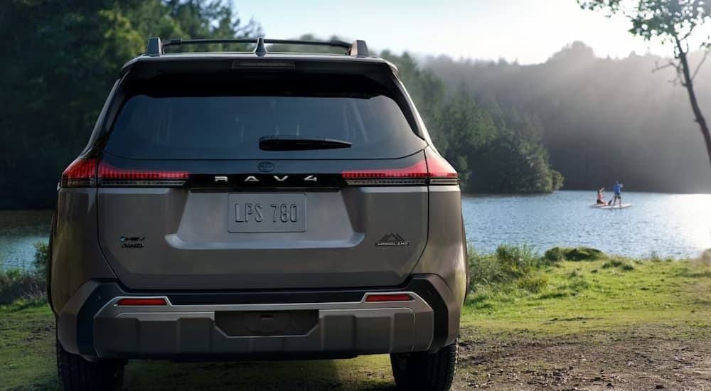 A gray 2026 Toyota RAV4 parked by a lake