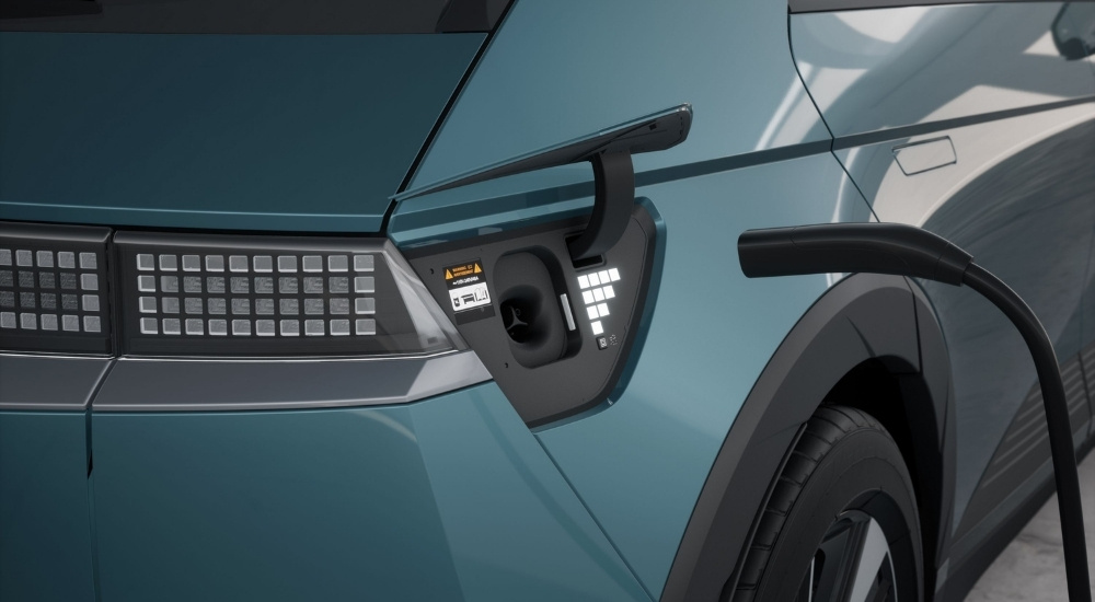 Close up of the charging port on a blue 2025 Hyundai IONIQ 5.