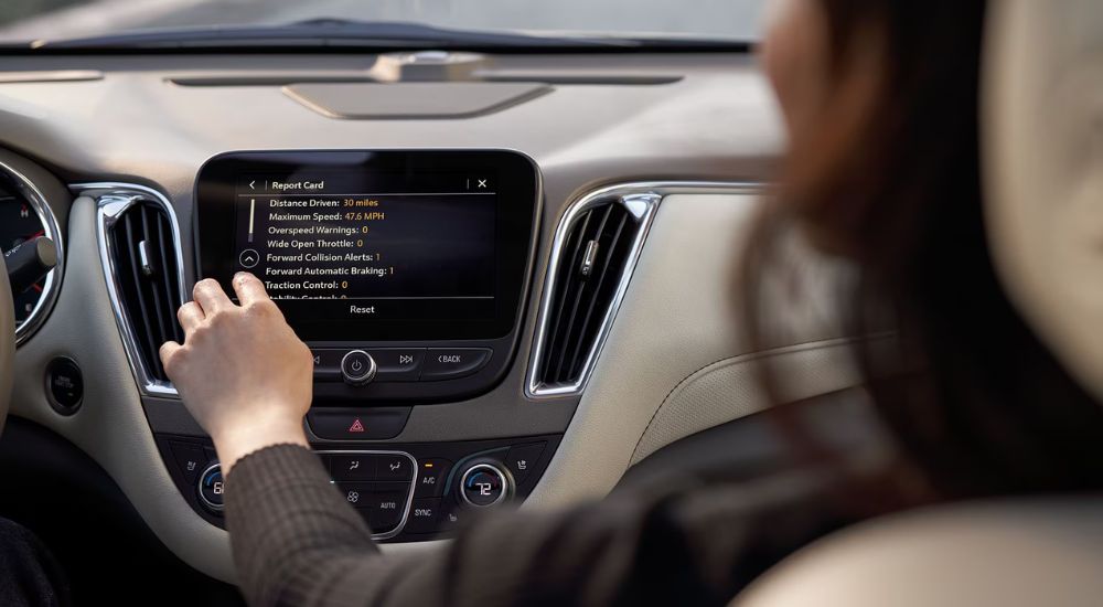 Chevrolet Teen Driver Report Card showing on a 2021 Chevy Equinox.