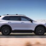 A white 2023 Honda CR-V for sale is shown from the side.